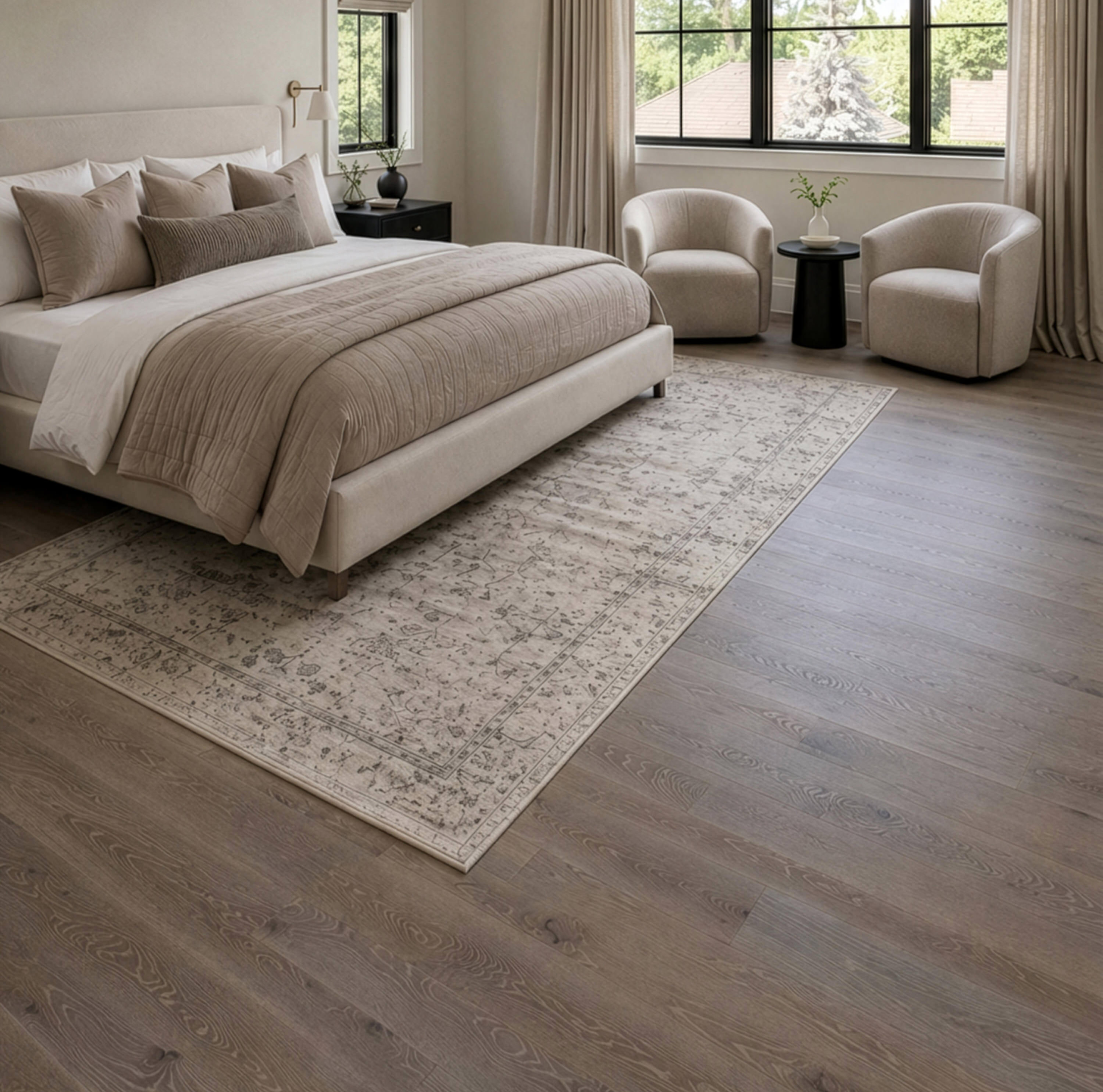 Cerused hardwood floor with pale contrasting grain in a finished bedroom